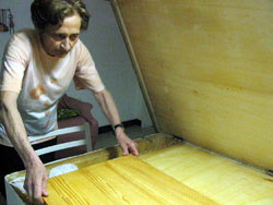 Signora Sandelli makes her own pasta in this compartment built into her kitchen table.