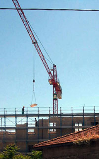 Several cranes dot the horizon in and around Cagli.
