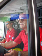 picture of yellow cross members sitting in ambulance