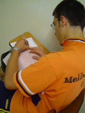 A driving student takes an exam to test their knowledge of the road.