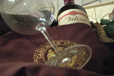 Wine bottle and wine glasses.