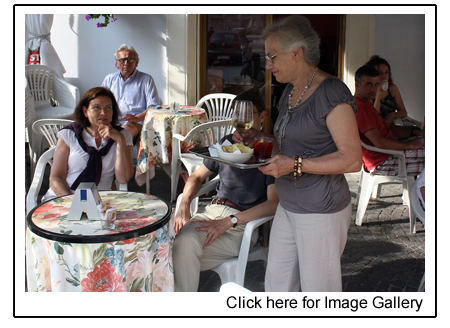 Mimi serves customers