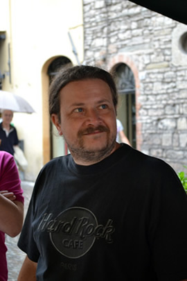 A portrait of Alessandro Chegai as he sets up for his slow food meeting.