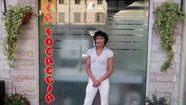 Marina Guerra stands in front of La Focaccia