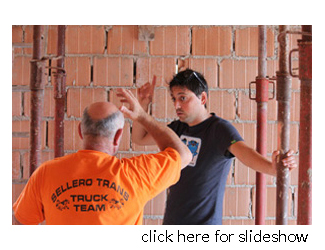 Gago talking with a crew member.