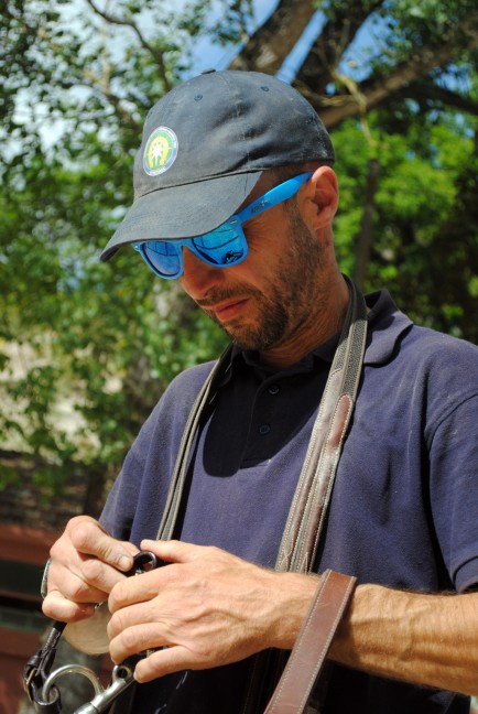 Luca Panunzi prepares a horse bridle.
