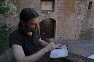 Along the outer walls of Urbino, Barsotti points to the stop where he is standing. Da Vinci had few ways to measure the structures and drew the pictures based only on what he could see.