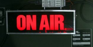 This sign indicates whether or not the radio container is currently recording material such as interviews.