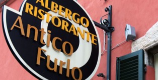 The sign outside of the restaurant says “Albergo Ristorante” meaning hotel and restaurant.