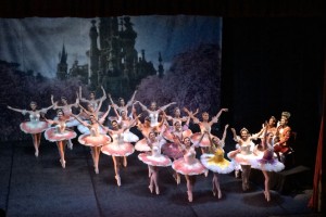 The first act of Sleeping Beauty features senior –level dancers as they are en pointe, raised towards the audience, welcoming the birth of Princess Aurora, as the King and Queen applaud their performance.