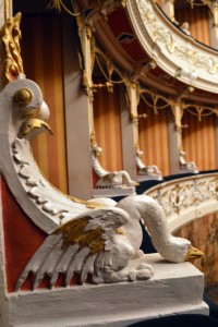 The intricately carved balconies that line the walls of Teatro Comunale.