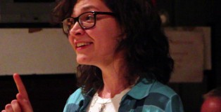 University of Urbino choir member Elisa Baggiarini sings her name at the group's end-of-season party.