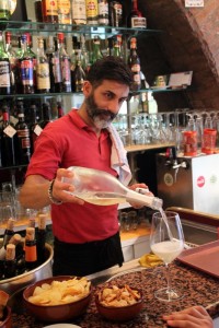 Gigi serves local wines in his shop, and his customers ask for them regularly.