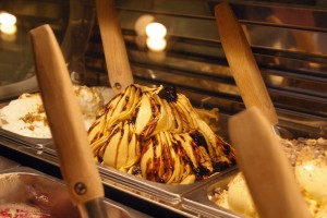 Close up of gelato topped with figs.
