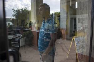 Veli Ljatifovski stands outside Bar Raffaello which closed two years ago. 